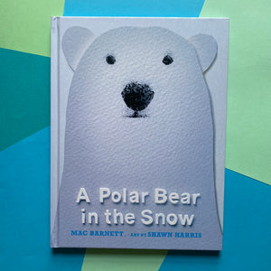A Polar Bear In The Snow
